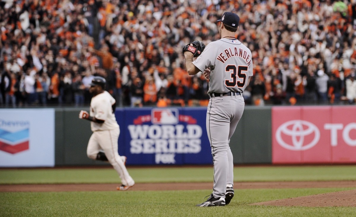 Justin Verlander watches in shock as Pablo Sandoval rounds the bases after one of his three home runs in Game 1 of the 2012 World Series.