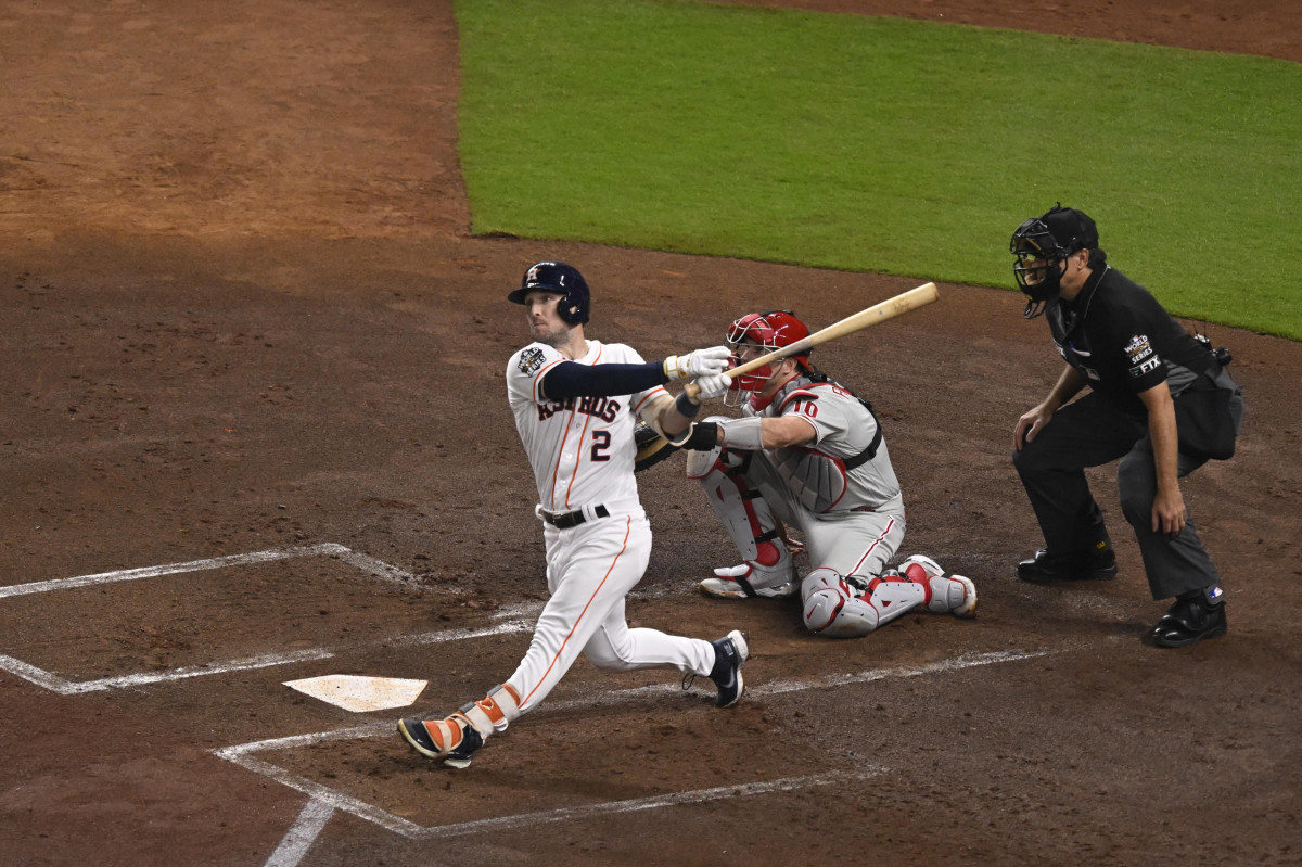 Astros third baseman Alex Bregman hits a double against the Phillies in Game 1 of the World Series.