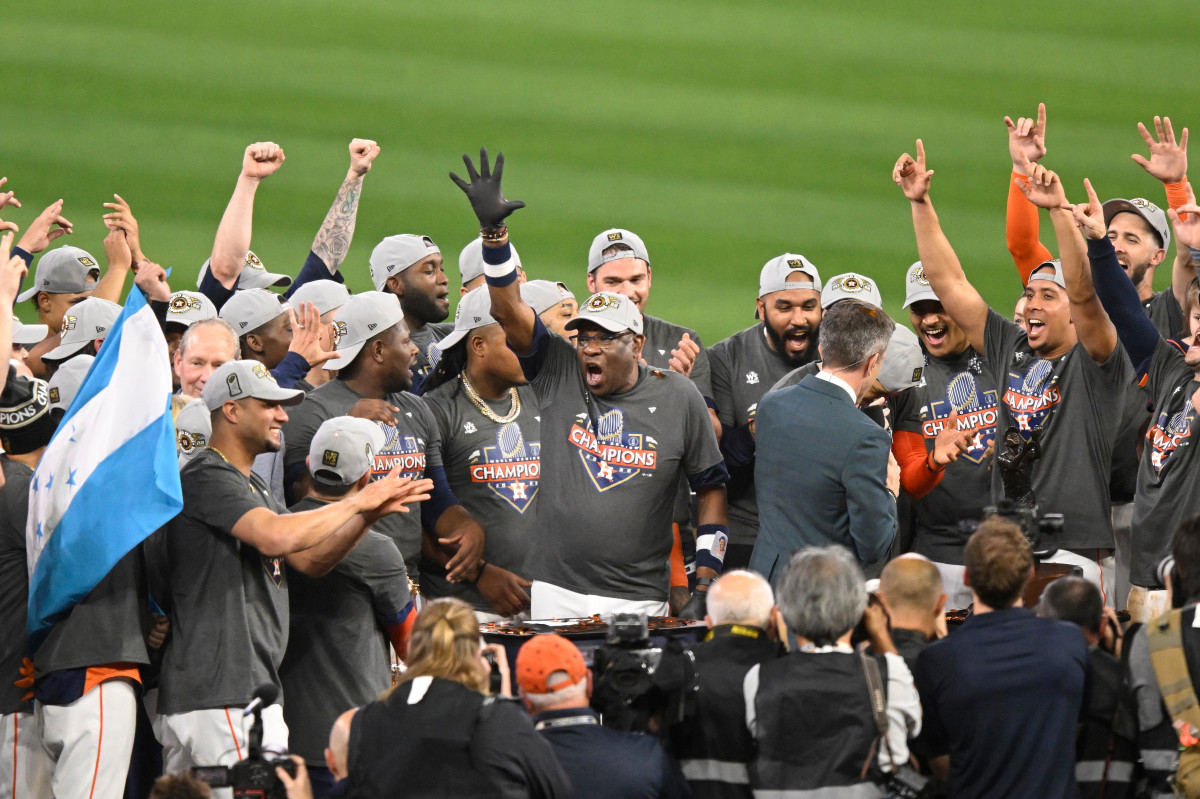 Dusty Baker and the Astros celebrate winning the World Series over the Phillies.