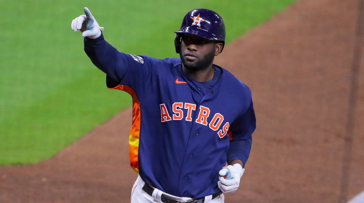 Astros left fielder Yordan Alvarez reacts after hitting a three-run homer in Game 6 of the World Series