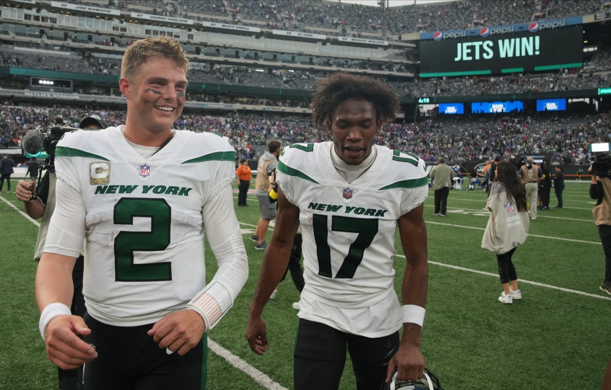 Zach Wilson and Garrett Wilson celebrate the Jets' win over the Bills in Week 9.