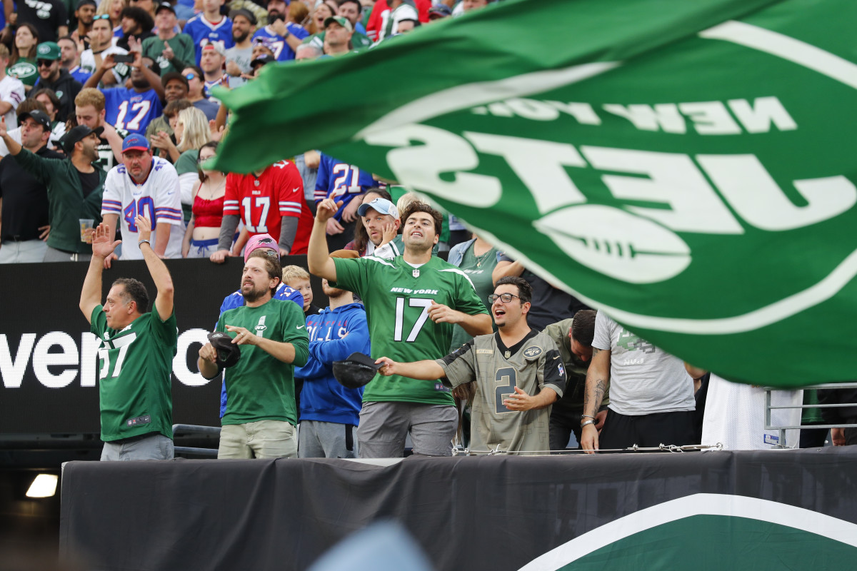 Jets fans celebrate during the team's win over the Bills