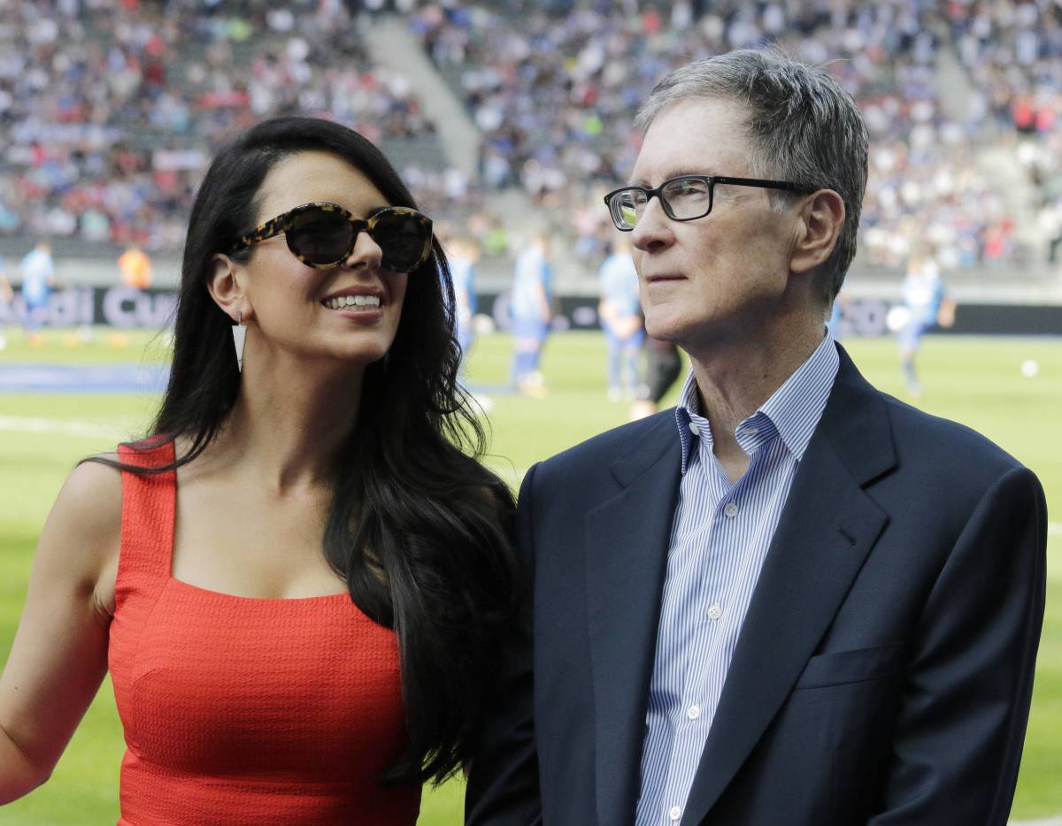 John Henry, founder of Fenway Sports Group, pictured at a Liverpool FC game in 2017 with his wife Linda Pizzuti