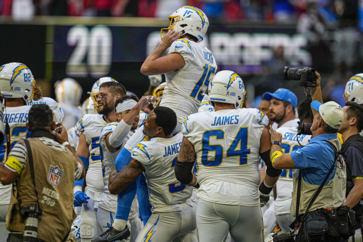 Chargers kicker Cameron Dicker is carried off the field after his game-winning field goal against the Falcons in Week 9.
