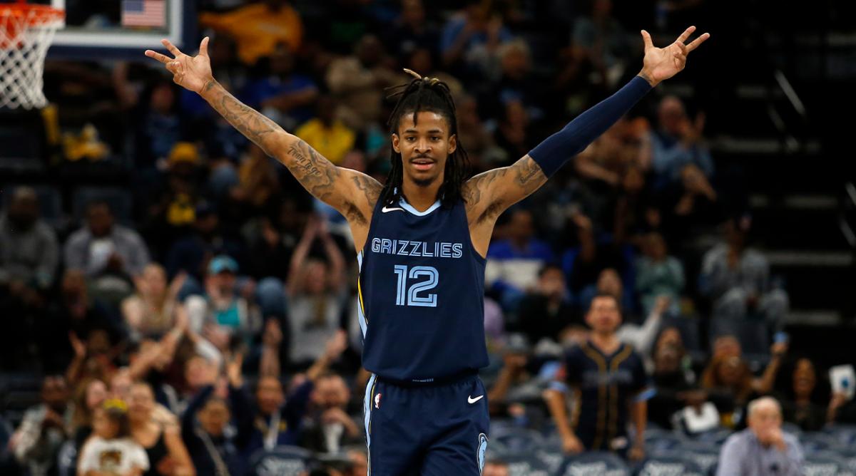Nov 4, 2022; Memphis, Tennessee, USA; Memphis Grizzlies guard Ja Morant (12) reacts during the second half against the Charlotte Hornets at FedExForum.