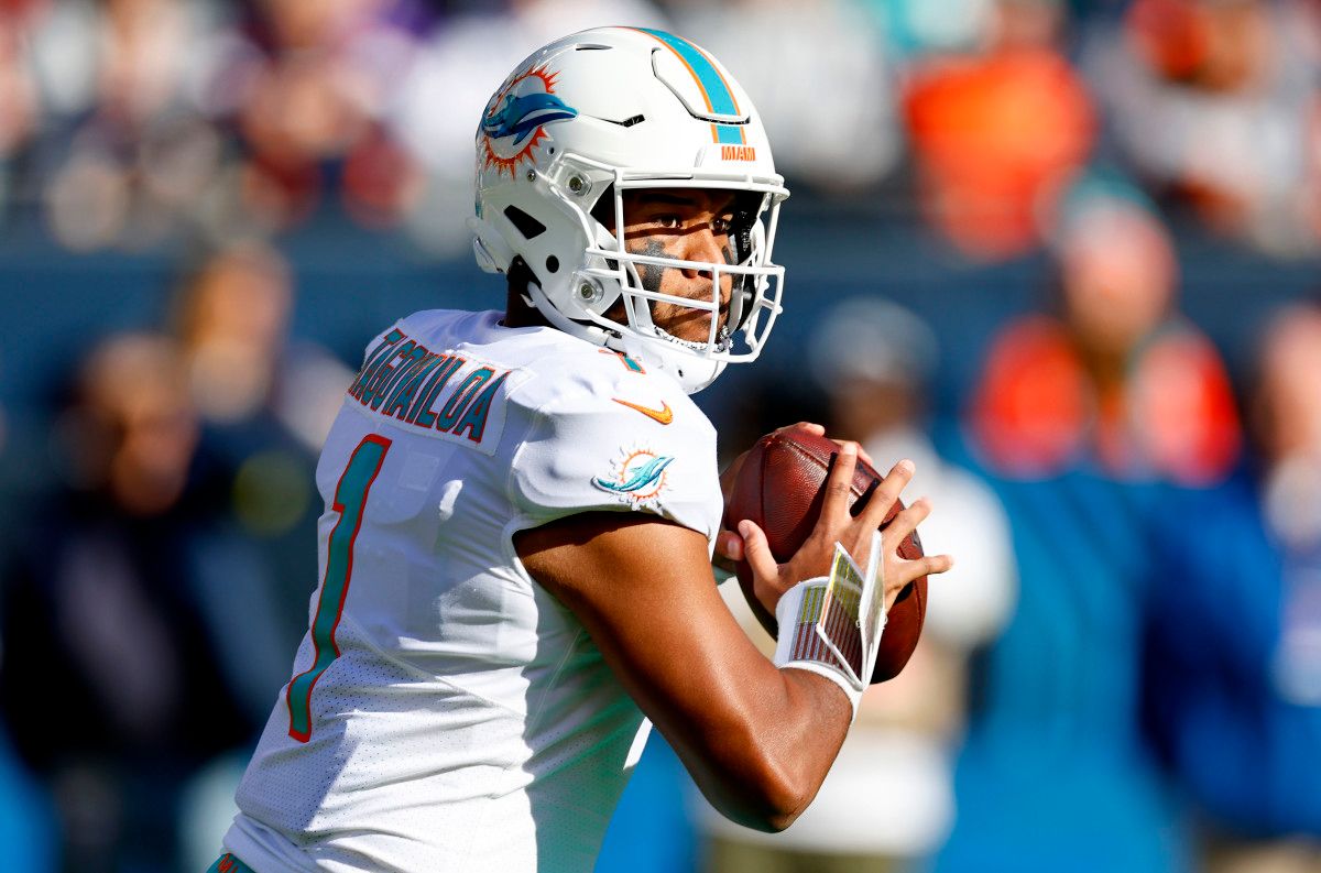 Miami Dolphins quarterback Tua Tagovailoa (1) drops back to pass against the Chicago Bears during the second half at Soldier Field.