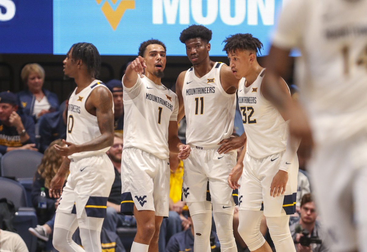 Nov 7, 2022; Morgantown, West Virginia, USA; West Virginia Mountaineers forward Emmitt Matthews Jr. (1) talks to teammates during the first half against the Mount St. Mary's Mountaineers at WVU Coliseum.