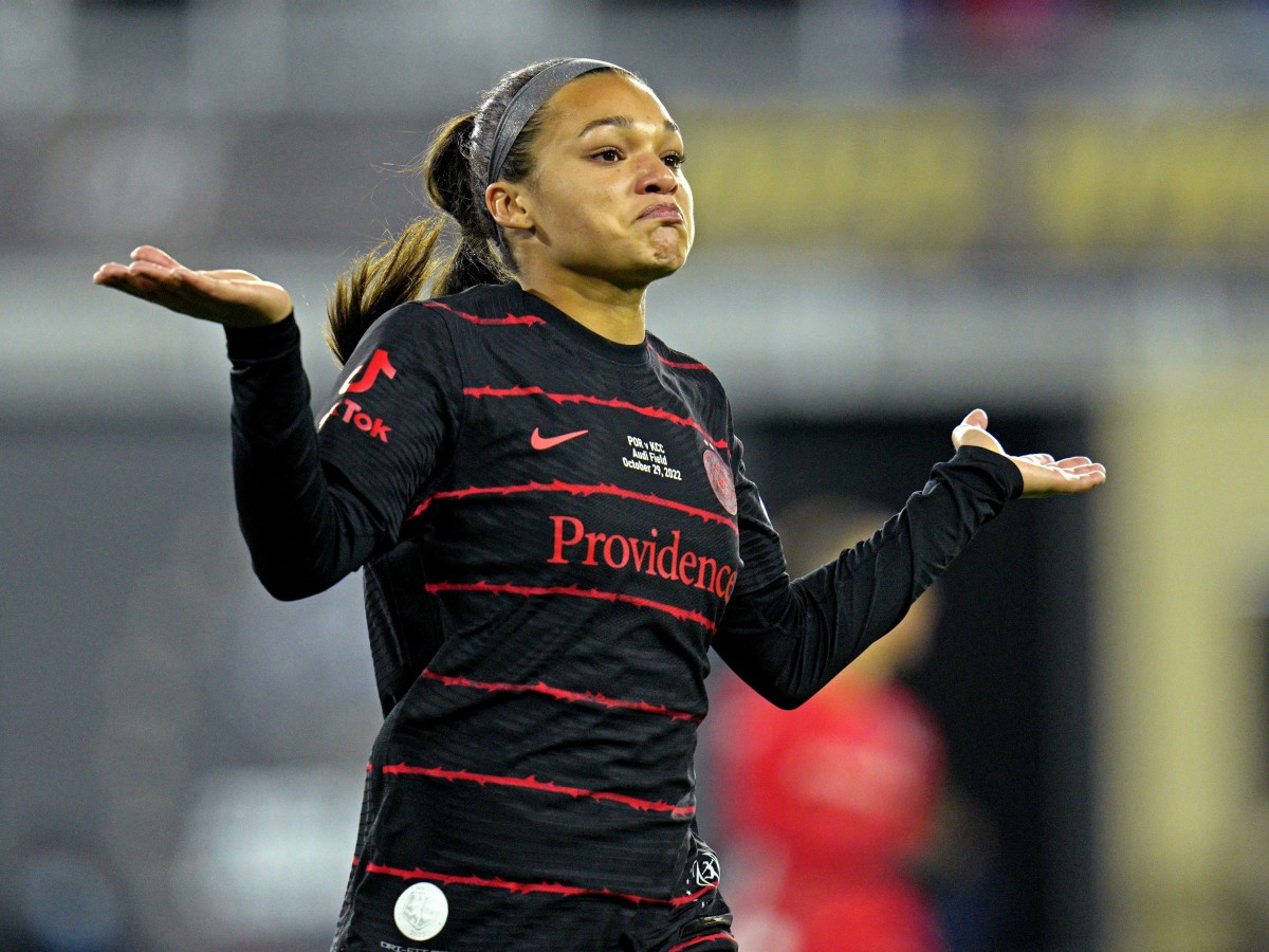 Portland Thorns’ Sophia Smith shrugs during her celebration after scoring a goal in the 2022 NWSL championship game.