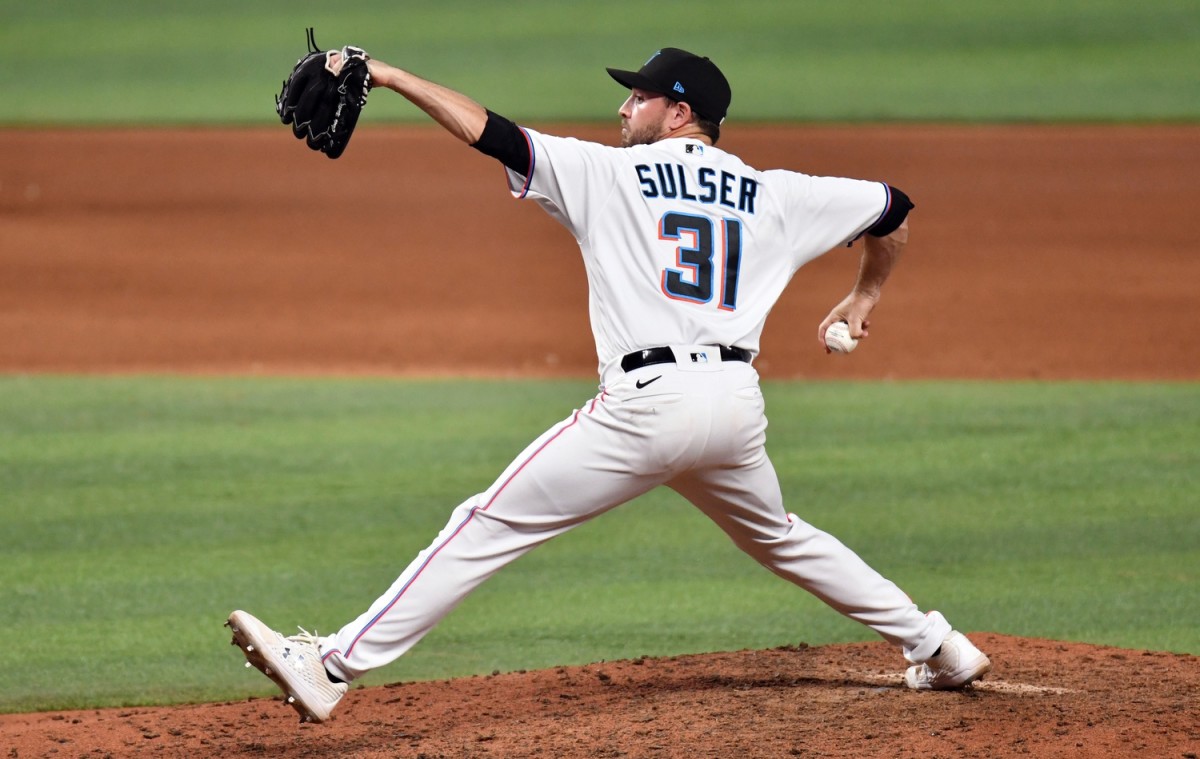 May 15, 2022; Miami, Florida, USA; Miami Marlins pitcher Cole Sulser (31) delivers during the eighth inning against the Milwaukee Brewers at loanDepot Park. Mandatory Credit: Jim Rassol-USA TODAY Sports