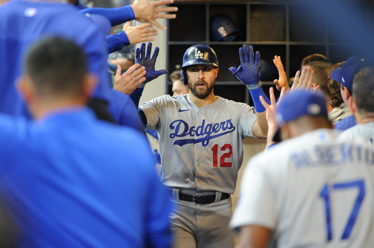 Dodgers Joey Gallo gets high-fived in the dugout