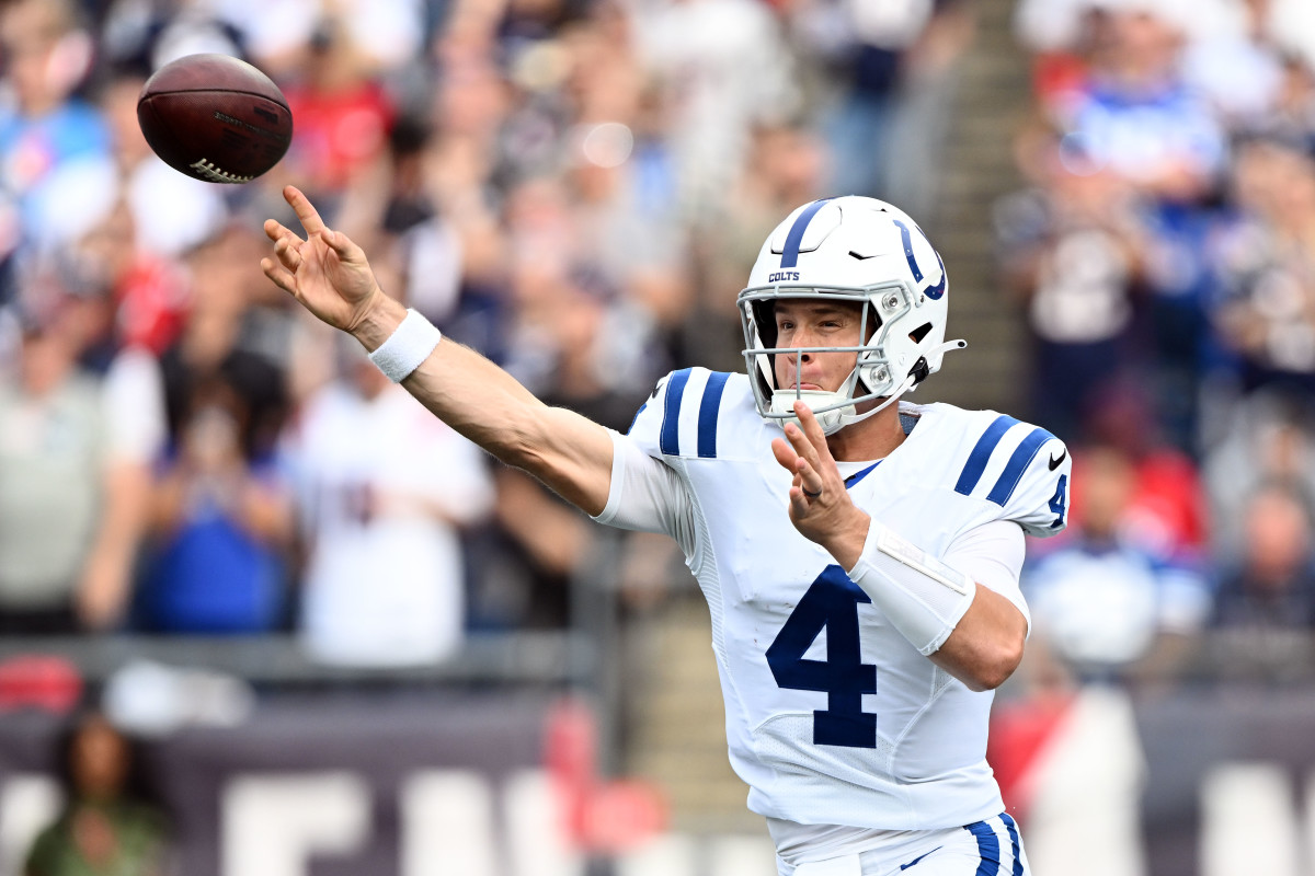 Nov 6, 2022; Foxborough, Massachusetts, USA; Indianapolis Colts quarterback Sam Ehlinger (4) throws the ball against the New England Patriots during the first half at Gillette Stadium. Mandatory Credit: Brian Fluharty-USA TODAY Sports