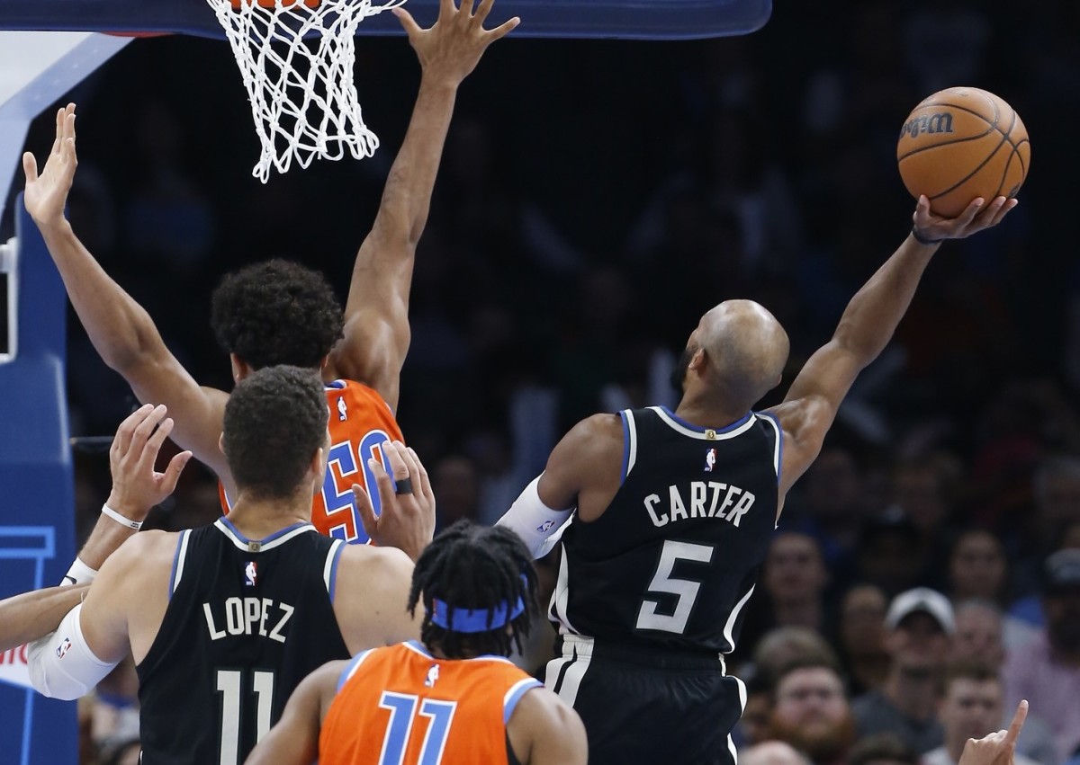 Nov 9, 2022; Oklahoma City, Oklahoma, USA; Milwaukee Bucks guard Jevon Carter (5) shoots against the Oklahoma City Thunder during the second quarter at Paycom Center.