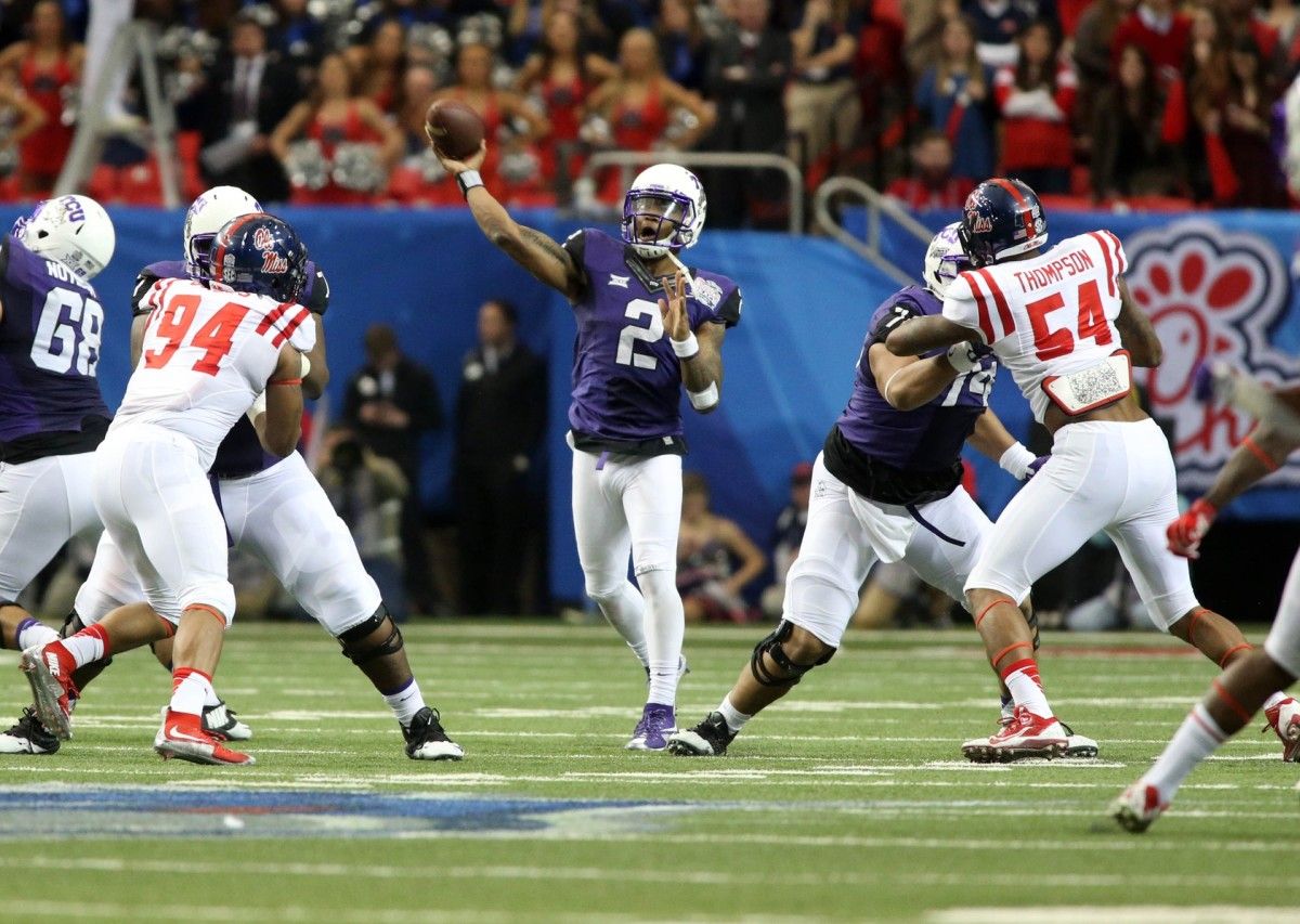 TCU Horned Frogs quarterback Trevone Boykin (2) throws the ball in the third quarter against the Mississippi Rebels in the 2014 Peach Bowl at the Georgia Dome.