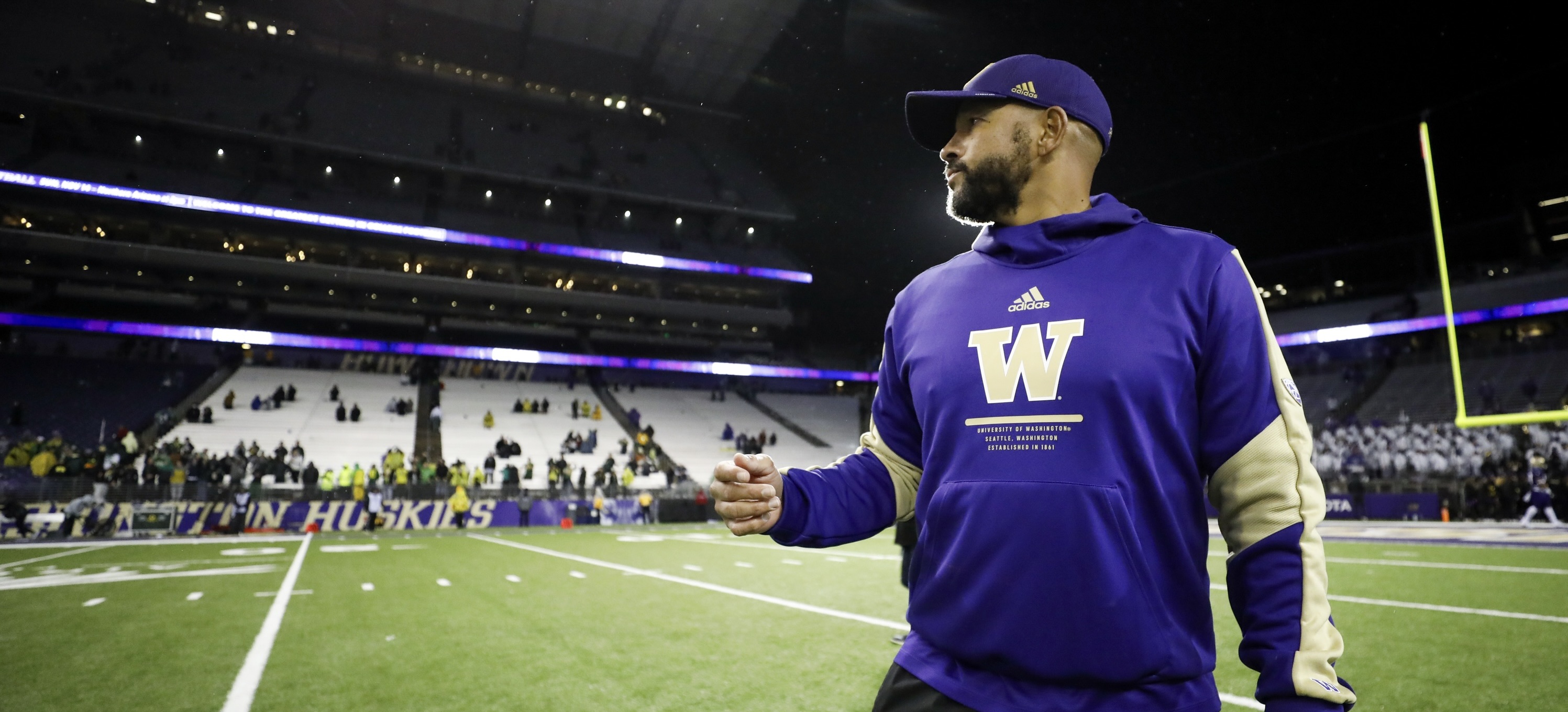 Jimmy Lake is shown at his final game as the Husky football coach.