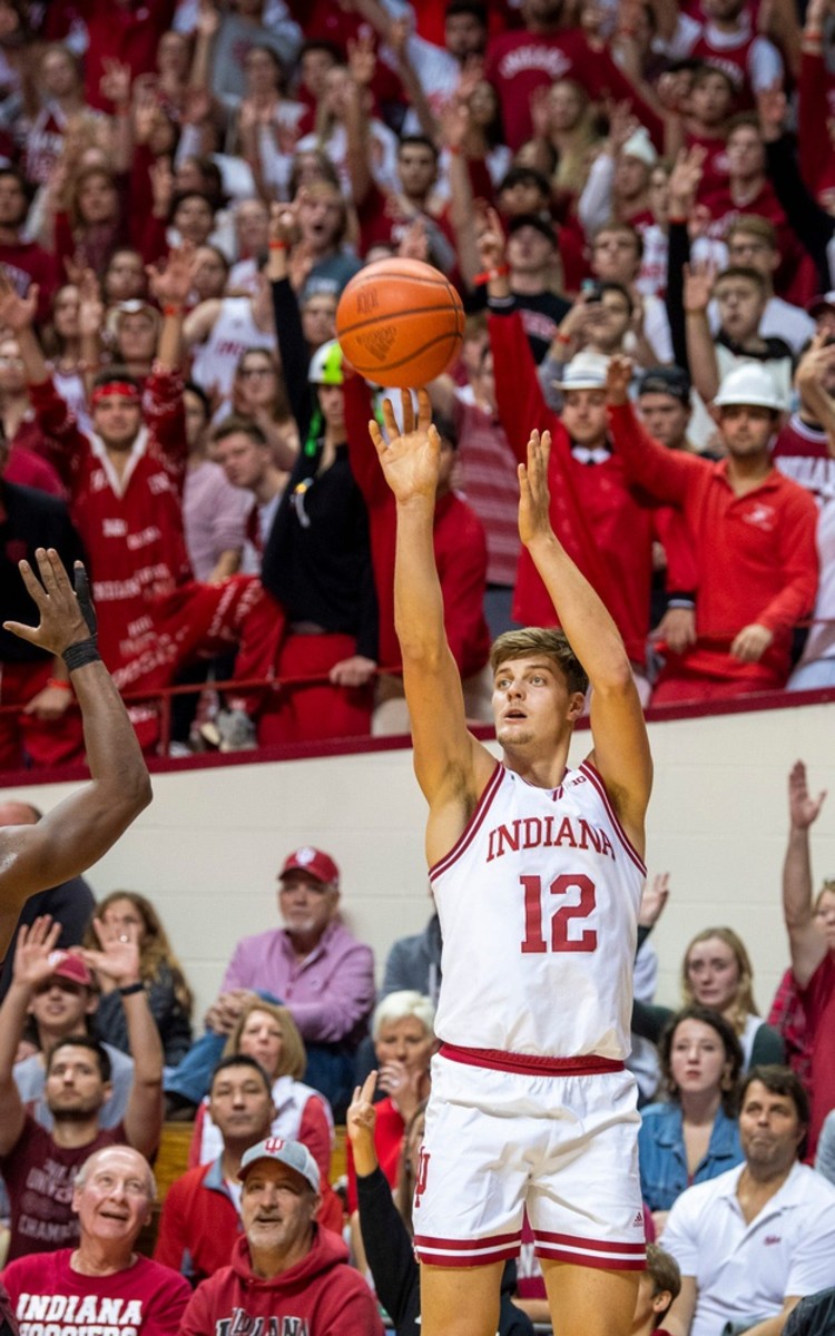 Indiana's Miller Kopp (12) makes a three-pointer during the first half against Bethune-Cookman on Thursday. (Rich Janzaruk/Herald-Times / USA TODAY NETWORK)