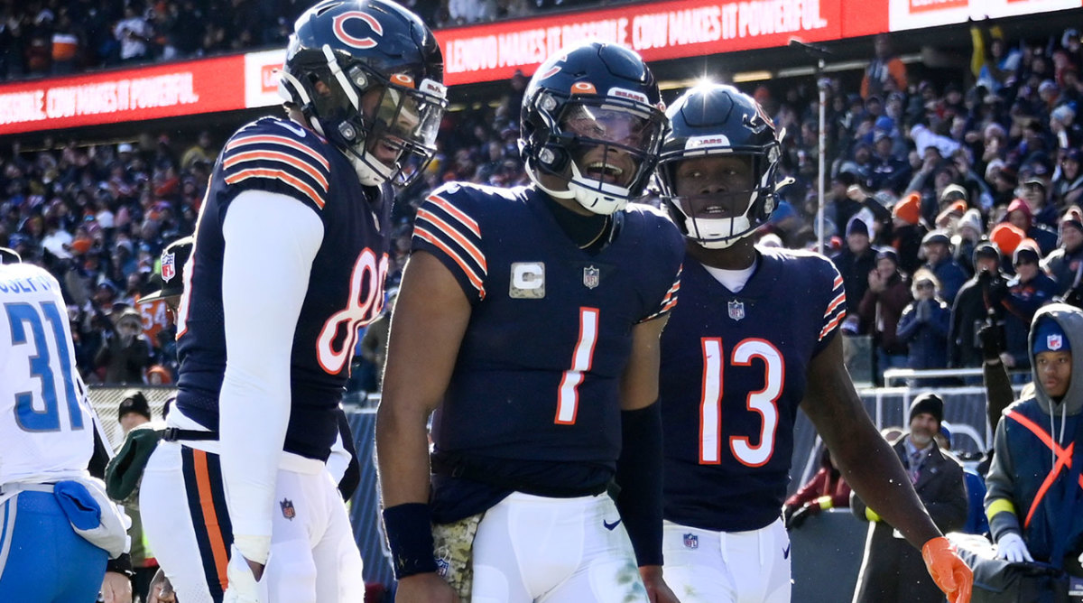 Justin Fields celebrates after a big play against the Lions.