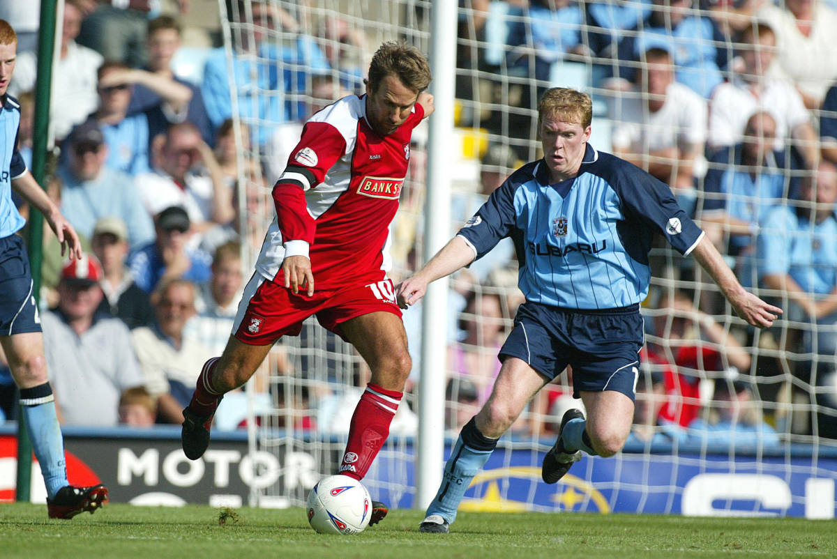 Paul Merson pictured (left) playing for Walsall in 2003