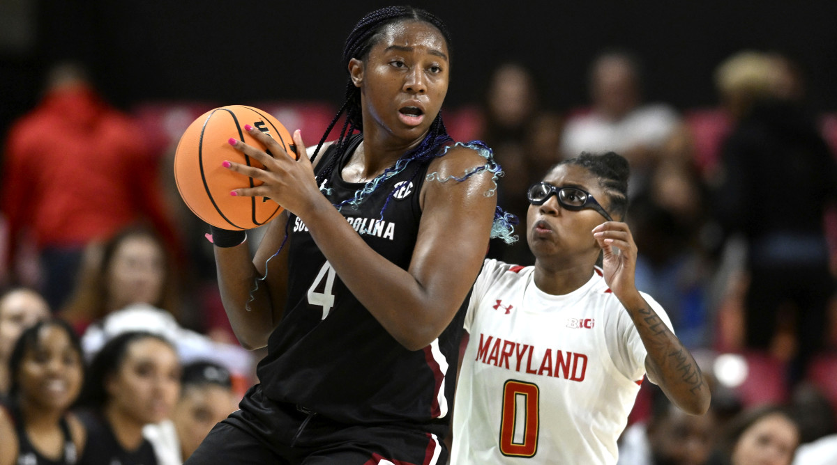 South Carolina’s Aliyah Boston looks to pass as Maryland’s Shyanne Sellers defends.