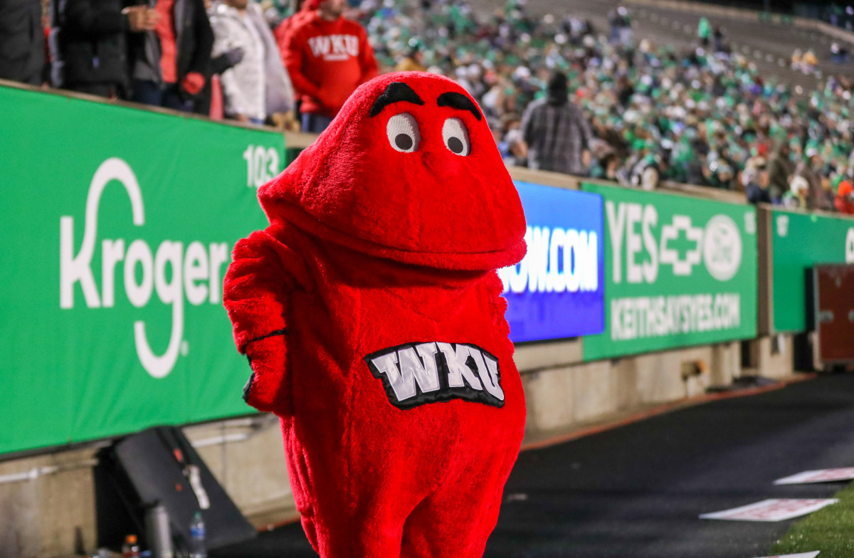 Nov 27, 2021; Huntington, West Virginia, USA; The Western Kentucky Hilltoppers mascot celebrates during the third quarter against the Marshall Thundering Herd at Joan C. Edwards Stadium. Mandatory Credit: Ben Queen-USA TODAY Sports