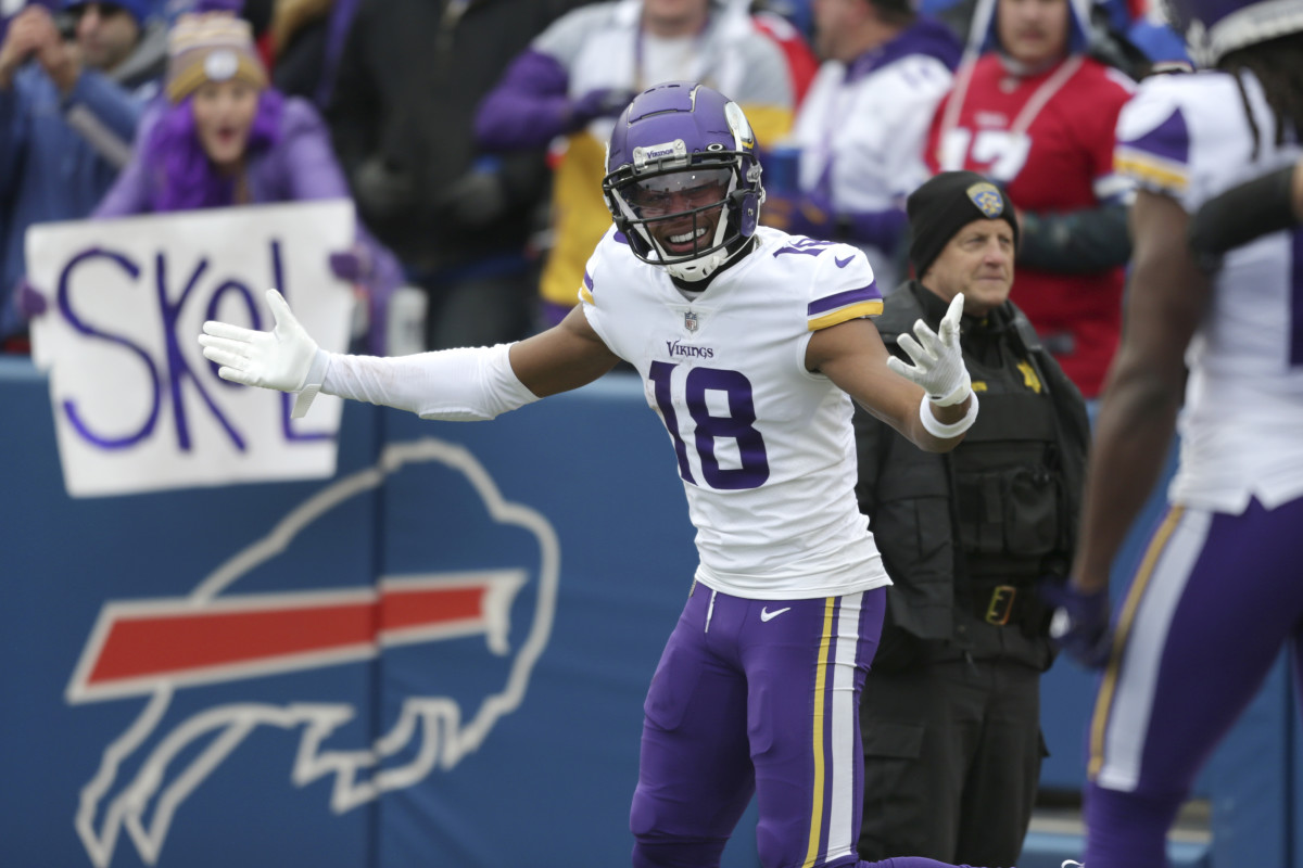 Justin Jefferson gestures after scoring an early touchdown in a victory over the Bills