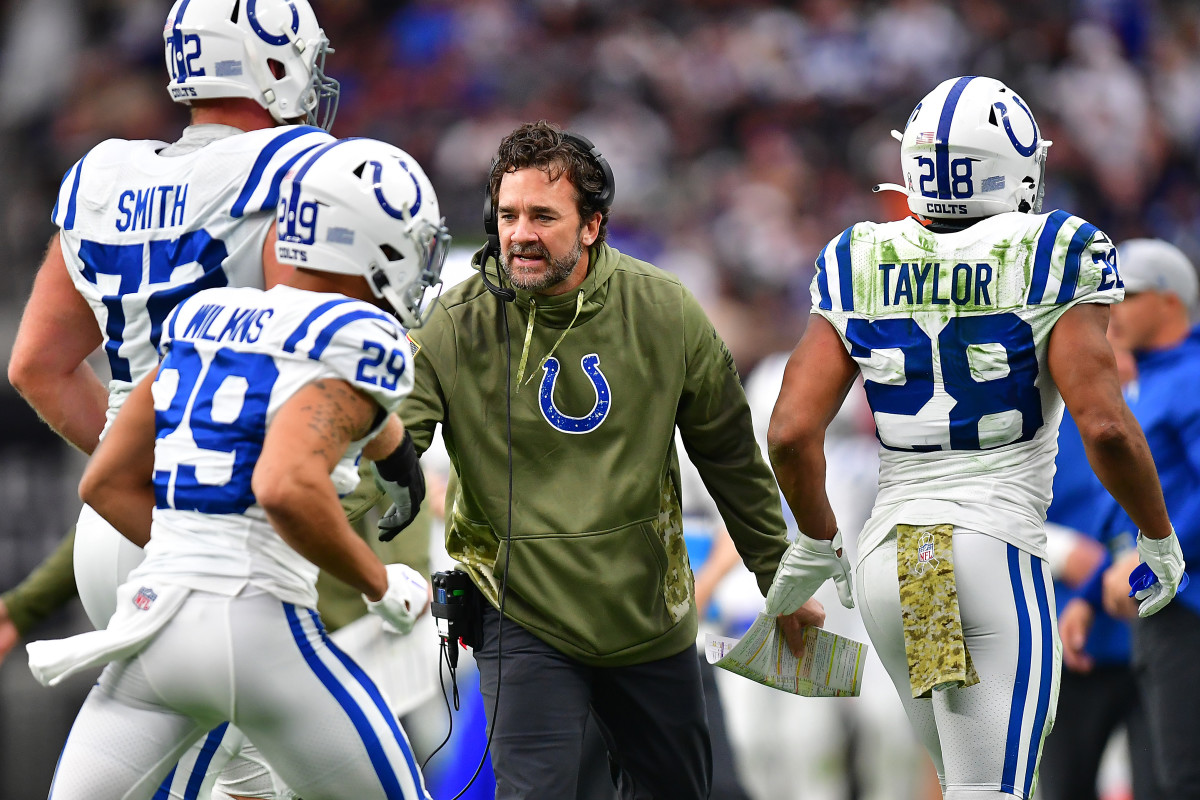 Indianapolis Colts head coach Jeff Saturday reacts with offensive tackle Braden Smith (72) running back Jonathan Taylor (28) and running back Jordan Wilkins (29).