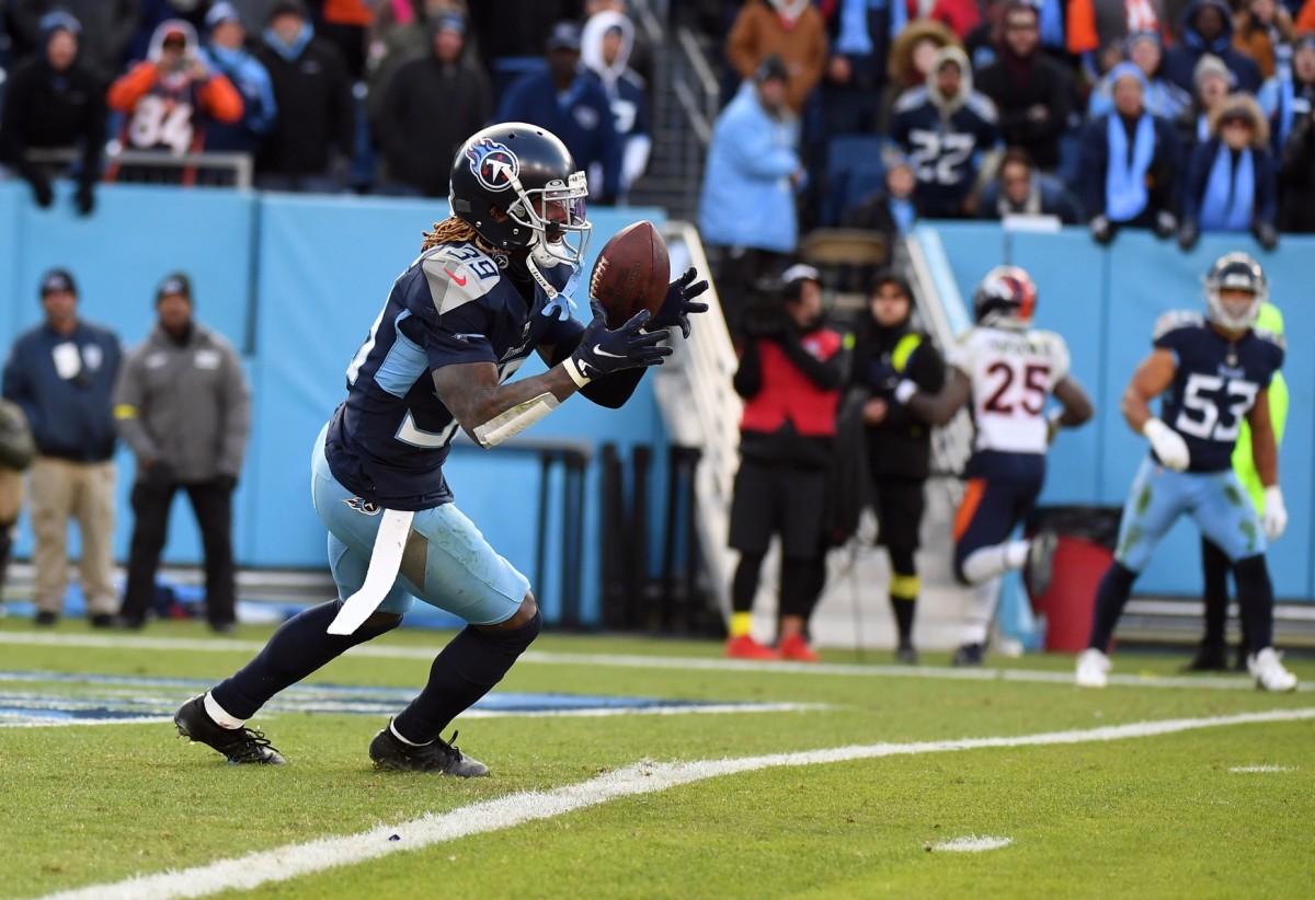 Tennessee Titans cornerback Terrance Mitchell (39) intercepts a pass in the end zone during the second half against the Denver Broncos at Nissan Stadium.