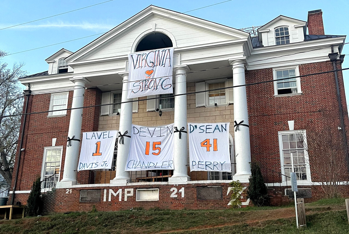 One of the many UVA frat houses paying tribute to three football players who were shot and killed on campus.