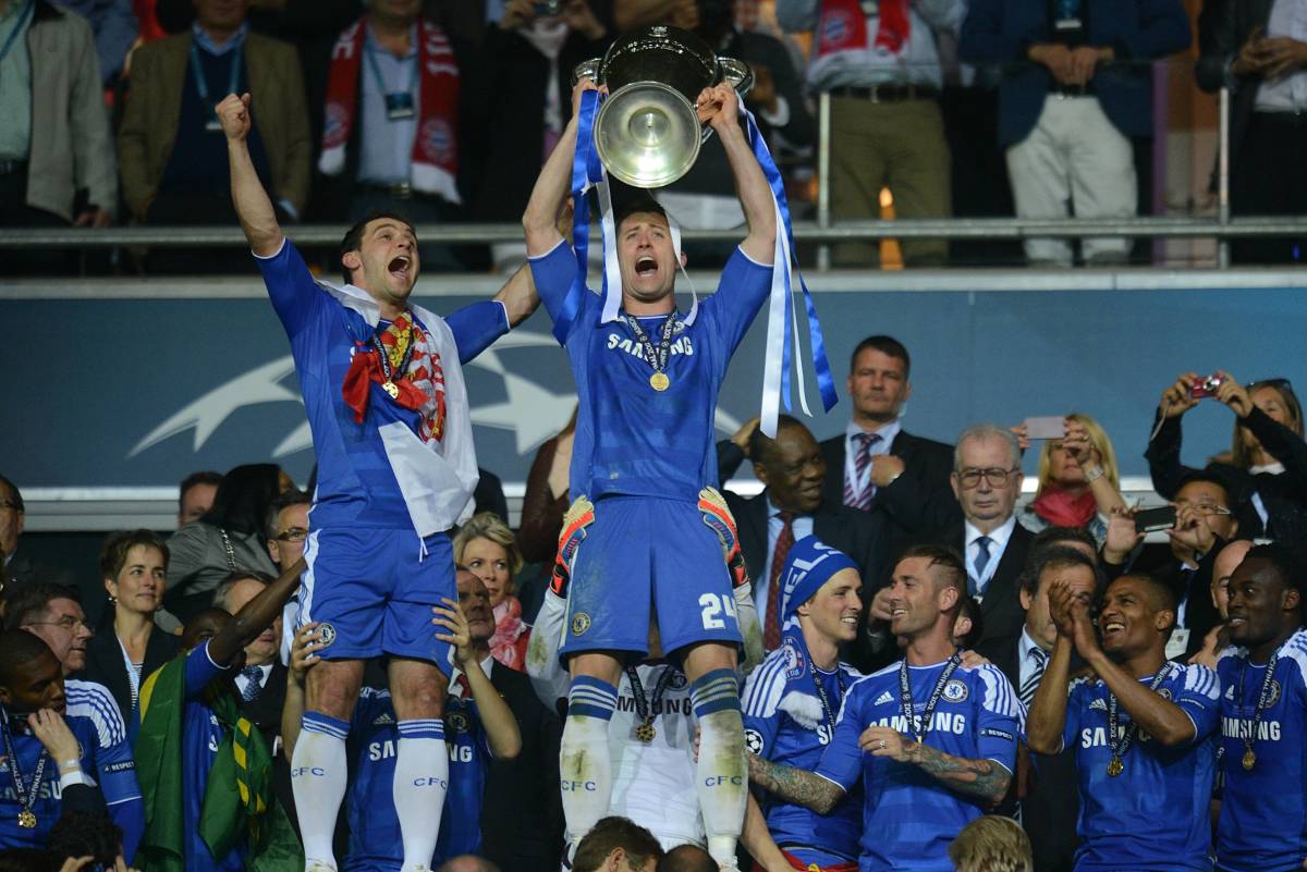 Gary Cahill pictured lifting the UEFA Champions League trophy after Chelsea's victory over Bayern Munich in the 2011/12 final
