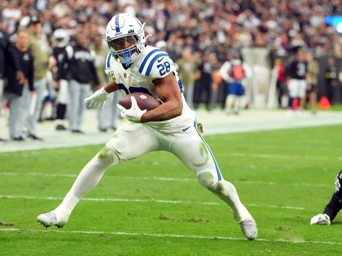 Nov 13, 2022; Paradise, Nevada, USA; Indianapolis Colts running back Jonathan Taylor (28) gains yardage against the Las Vegas Raiders during the first half at Allegiant Stadium.