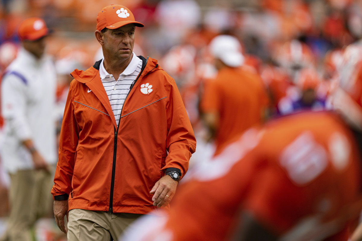 Clemson Tigers head coach Dabo Swinney looks on during warm ups before an NCAA college football game against the Furman Paladins in Clemson, S.C., Saturday, Sept. 10, 2022. (AP Photo/Jacob Kupferman)