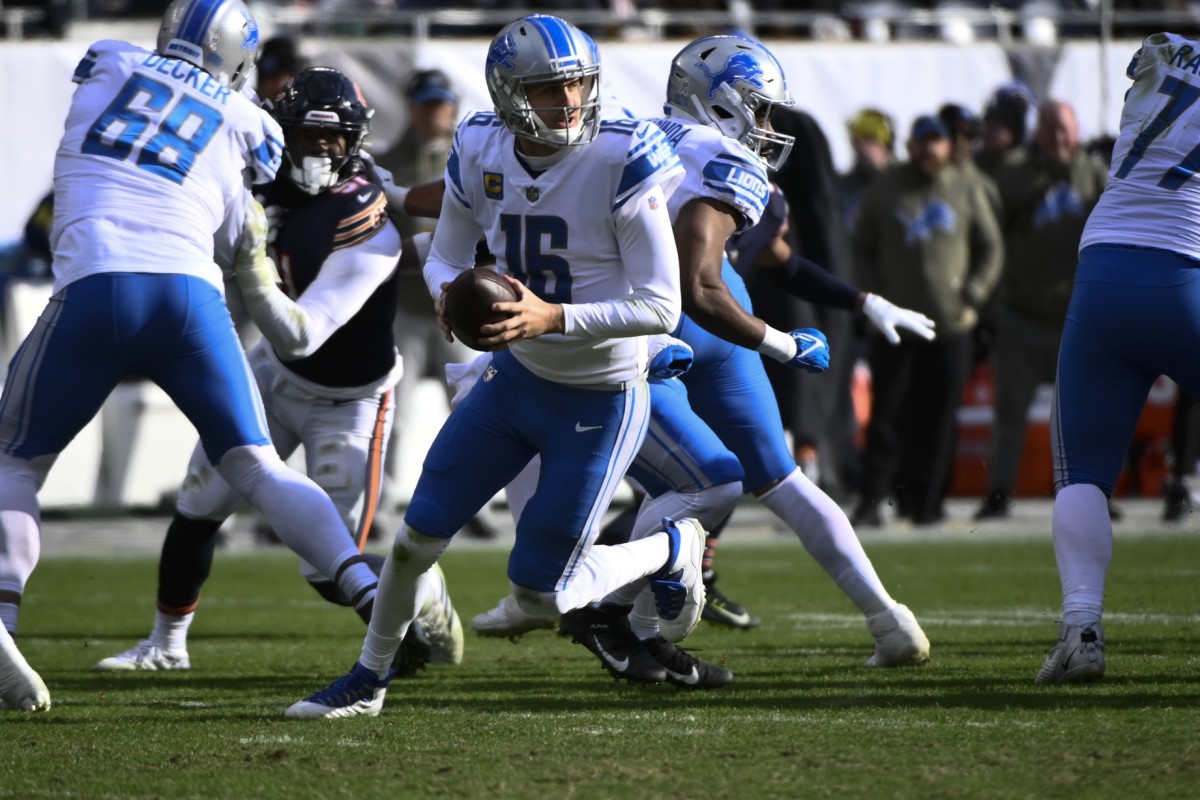 Nov 13, 2022; Chicago, Illinois, USA; Detroit Lions quarterback Jared Goff (16) looks to pass against the Chicago Bears during the second half at Soldier Field.