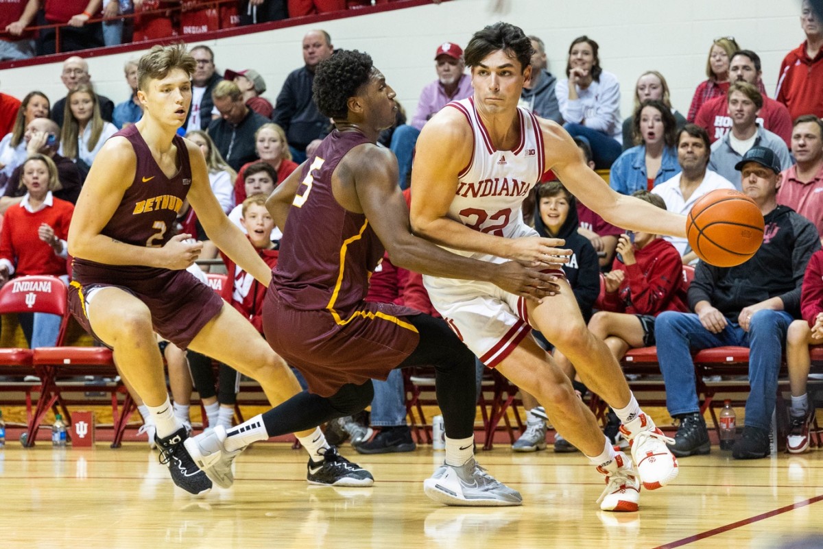 Indiana Hoosiers guard Trey Galloway (32) dribbles the ball while Bethune-Cookman Wildcats guard Damani McEntire (5) defends in the first half at Simon Skjodt Assembly Hall.