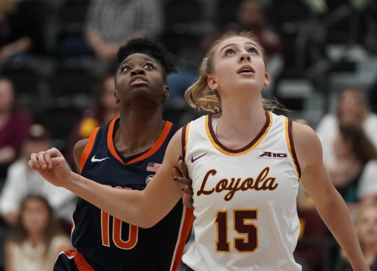 Mir McLean jostles for a rebound during the Virginia women's basketball game at Loyola.