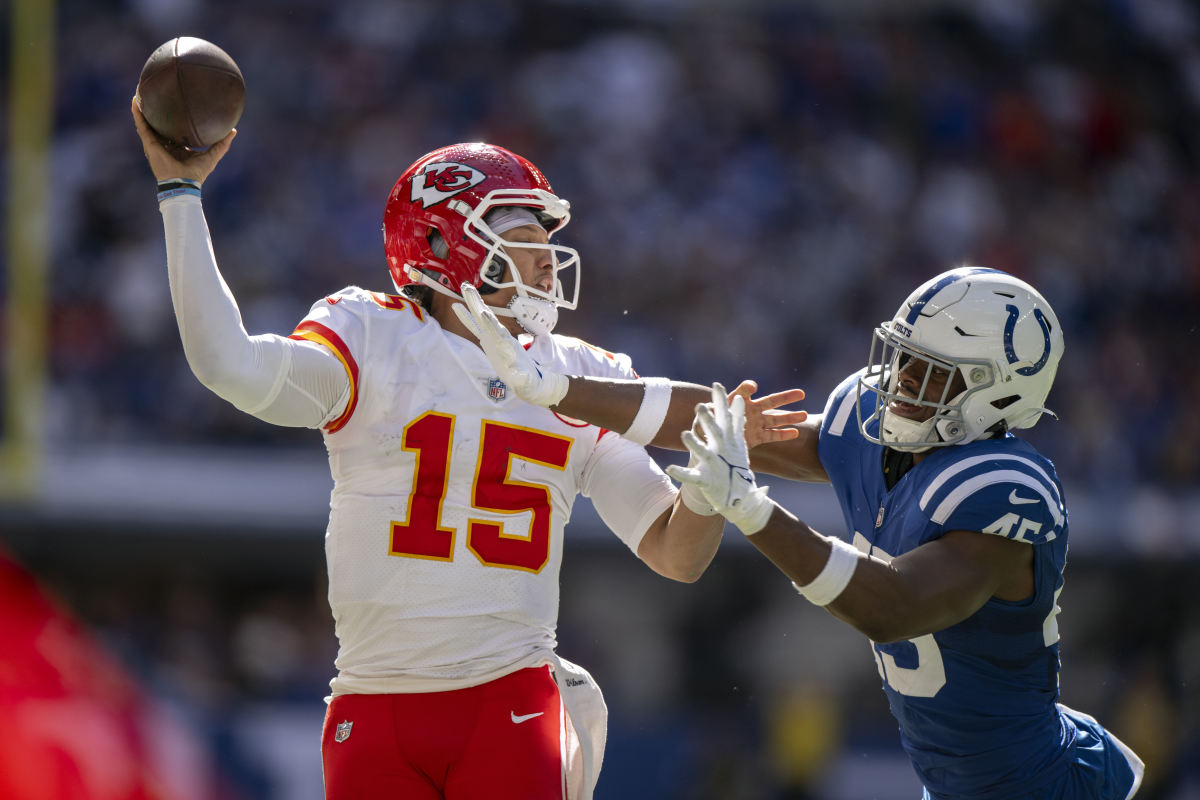 Sep 25, 2022; Indianapolis, Indiana, USA; Kansas City Chiefs quarterback Patrick Mahomes (15) tries to throw a pass over Indianapolis Colts linebacker E.J. Speed (45) during the second half at Lucas Oil Stadium.
