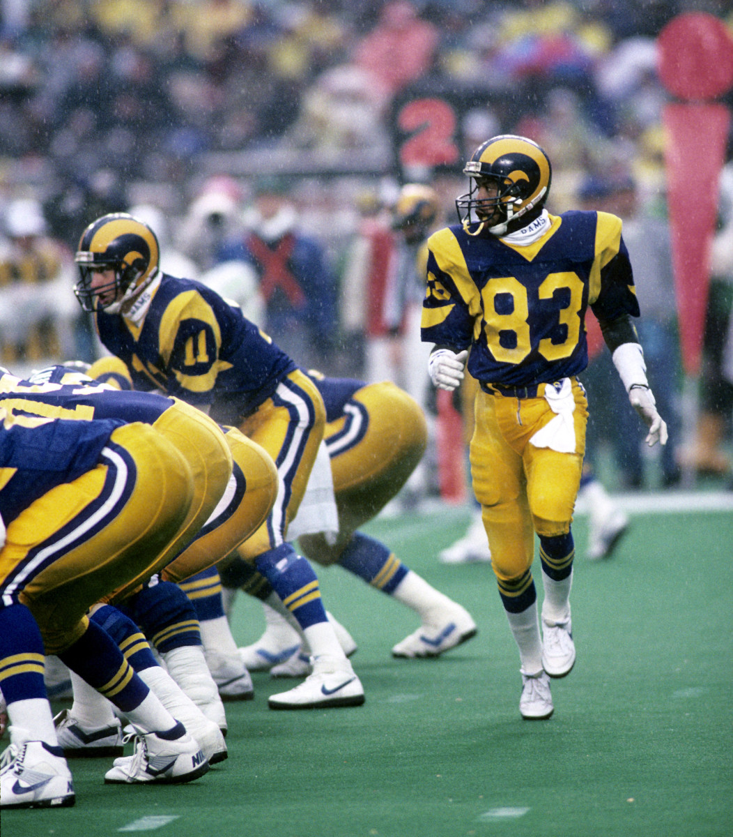 Flipper Anderson goes into motion behind Jim Everett