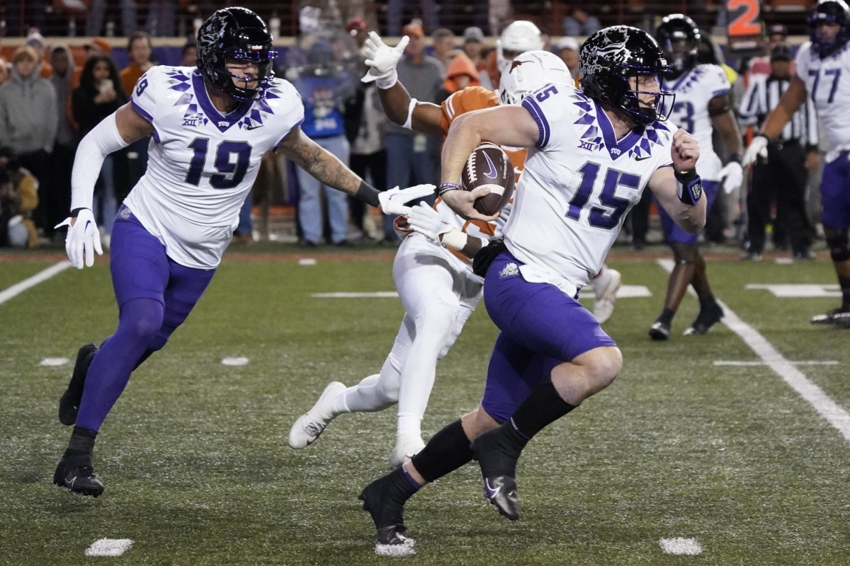 Texas Christian Horned Frogs quarterback Max Duggan (15) keeps the ball for yards during the second half against the Texas Longhorns at Darrell K Royal-Texas Memorial Stadium.