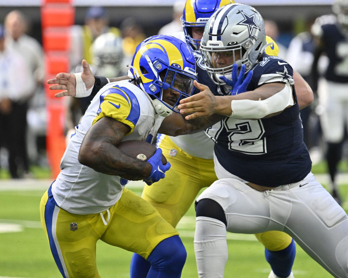 Los Angeles Rams running back Cam Akers (3) is tackled by Dallas Cowboys defensive tackle Trysten Hill (72). Mandatory Credit: Robert Hanashiro-USA TODAY