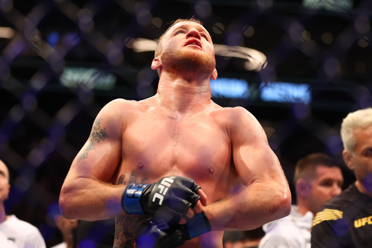 Justin Gaethje reacts following his loss against Charles Oliveira during UFC 274 at Footprint Center.