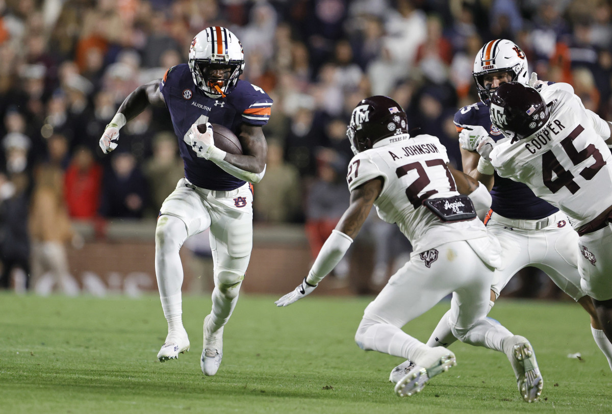 Alabama, USA; Auburn Tigers running back Tank Bigsby (4) carries during the second quarter against the Texas A&M Aggies at Jordan-Hare stadium.