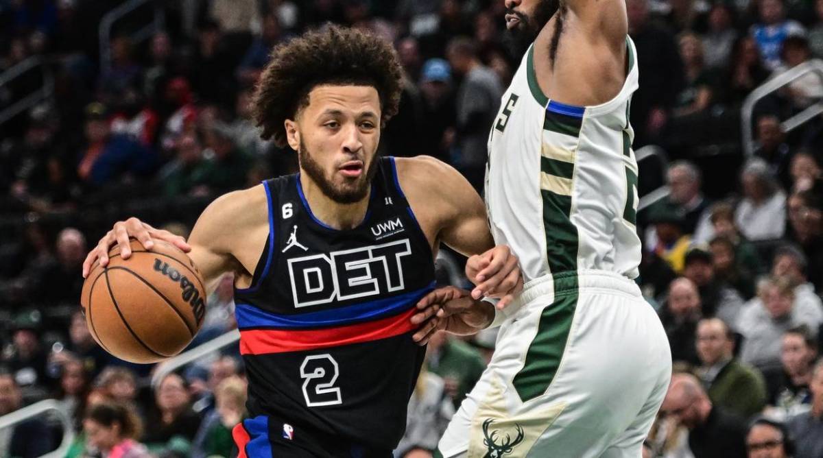 Pistons point guard Cade Cunningham drives to the basket in a game vs. the Milwaukee Bucks