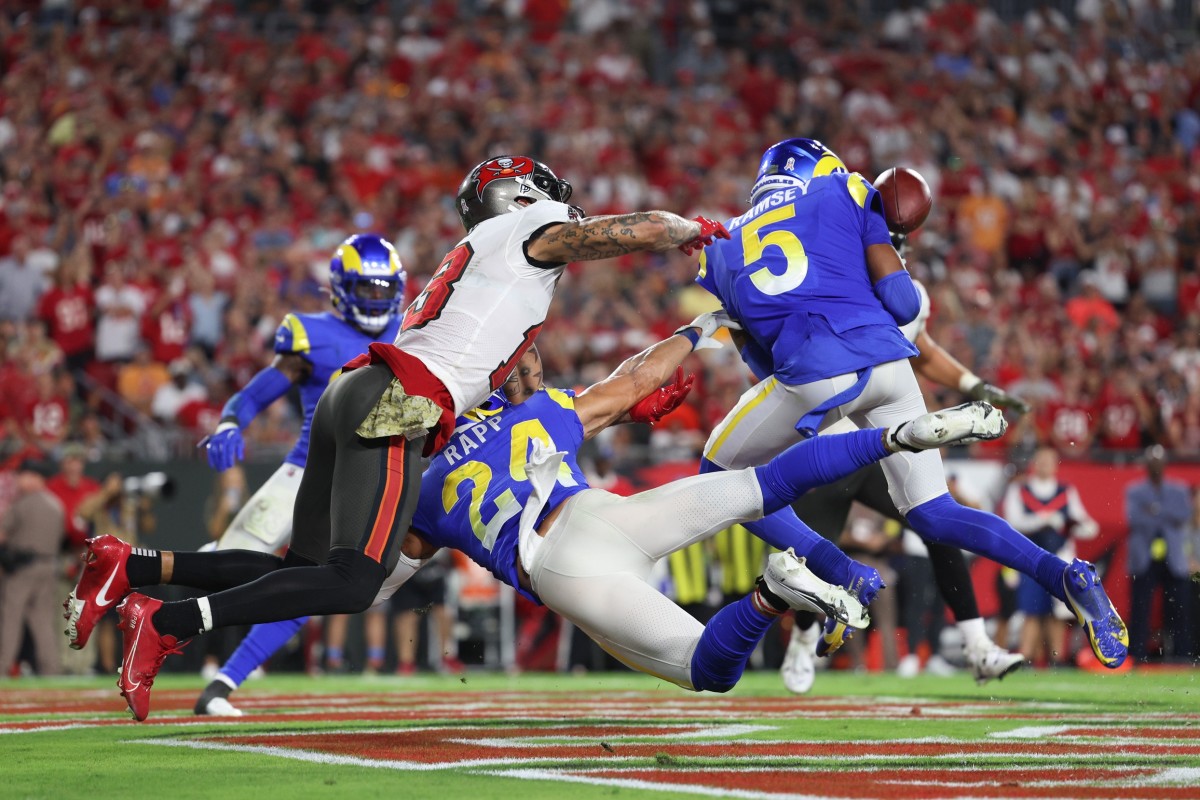 Los Angeles Rams cornerback Jalen Ramsey (5) breaks up a pass intended for Tampa Bay receiver Mike Evans (13). Mandatory Credit: Nathan Ray Seebeck-USA TODAY Sports