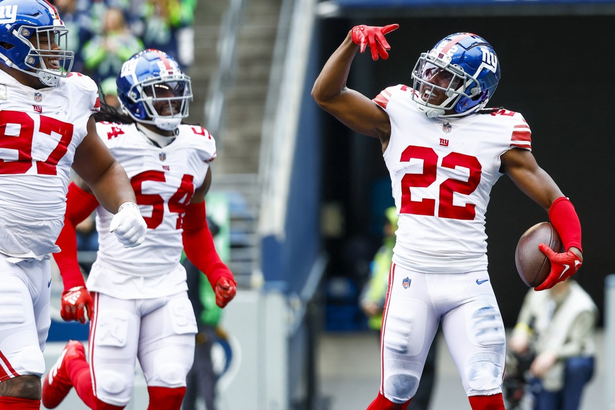 Oct 30, 2022; Seattle, Washington, USA; New York Giants cornerback Adoree Jackson (22) celebrates following a fumble recovery against the Seattle Seahawks during the second quarter at Lumen Field. New York Giants defensive tackle Dexter Lawrence (97) joins Jackson at left.