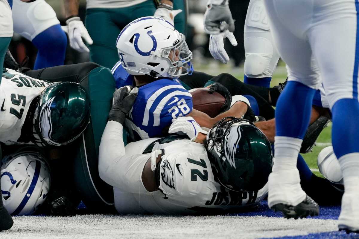 Indianapolis Colts running back Jonathan Taylor (28) falls into the end zone for a touchdown Sunday, Nov. 20, 2022, during a game against the Philadelphia Eagles at Lucas Oil Stadium in Indianapolis.