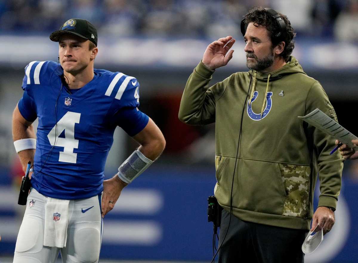 Indianapolis Colts quarterback Sam Ehlinger (4) stands next to Indianapolis Colts interim head coach Jeff Saturday on the sideline Sunday, Nov. 20, 2022, during a game against the Philadelphia Eagles at Lucas Oil Stadium in Indianapolis.