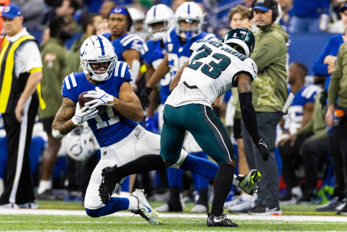 Nov 20, 2022; Indianapolis, Indiana, USA; Indianapolis Colts wide receiver Michael Pittman Jr. (11) catches the ball while Philadelphia Eagles safety C.J. Gardner-Johnson (23) defends in the second half at Lucas Oil Stadium.