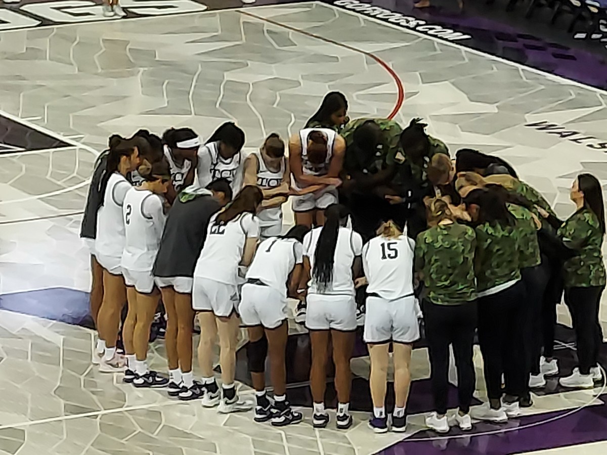 The TCU women's basketball team gathers after losing to South Florida.