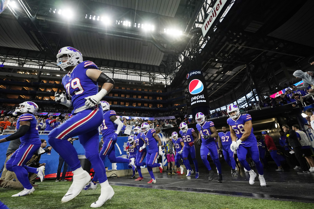 The Bills jog onto the field in Detroit before a game against the Browns