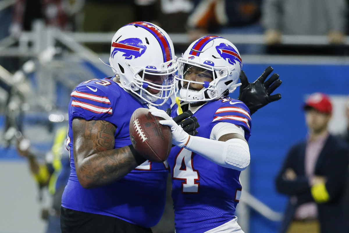 Bills teammates Dion Dawkins and Stefon Diggs celebrate a Diggs touchdown against the Browns