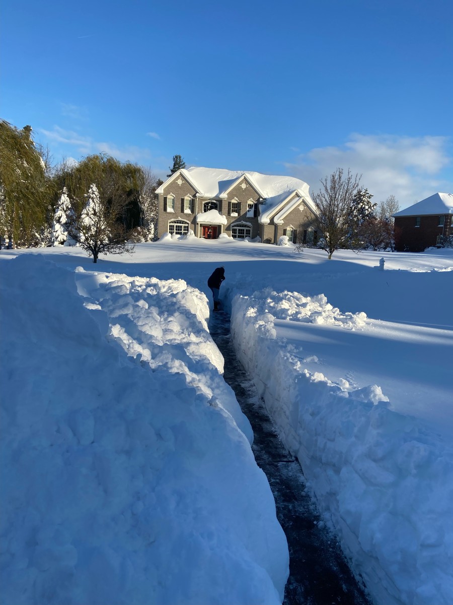 A path through the snow at Bill QB coach Joe Brady's house
