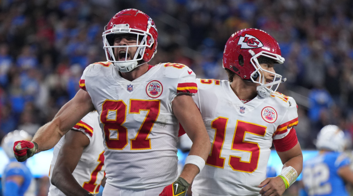 Chiefs tight end Travis Kelce and quarterback Patrick Mahomes celebrate after scoring a game-winning touchdown.